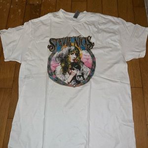 Four different band t shirts